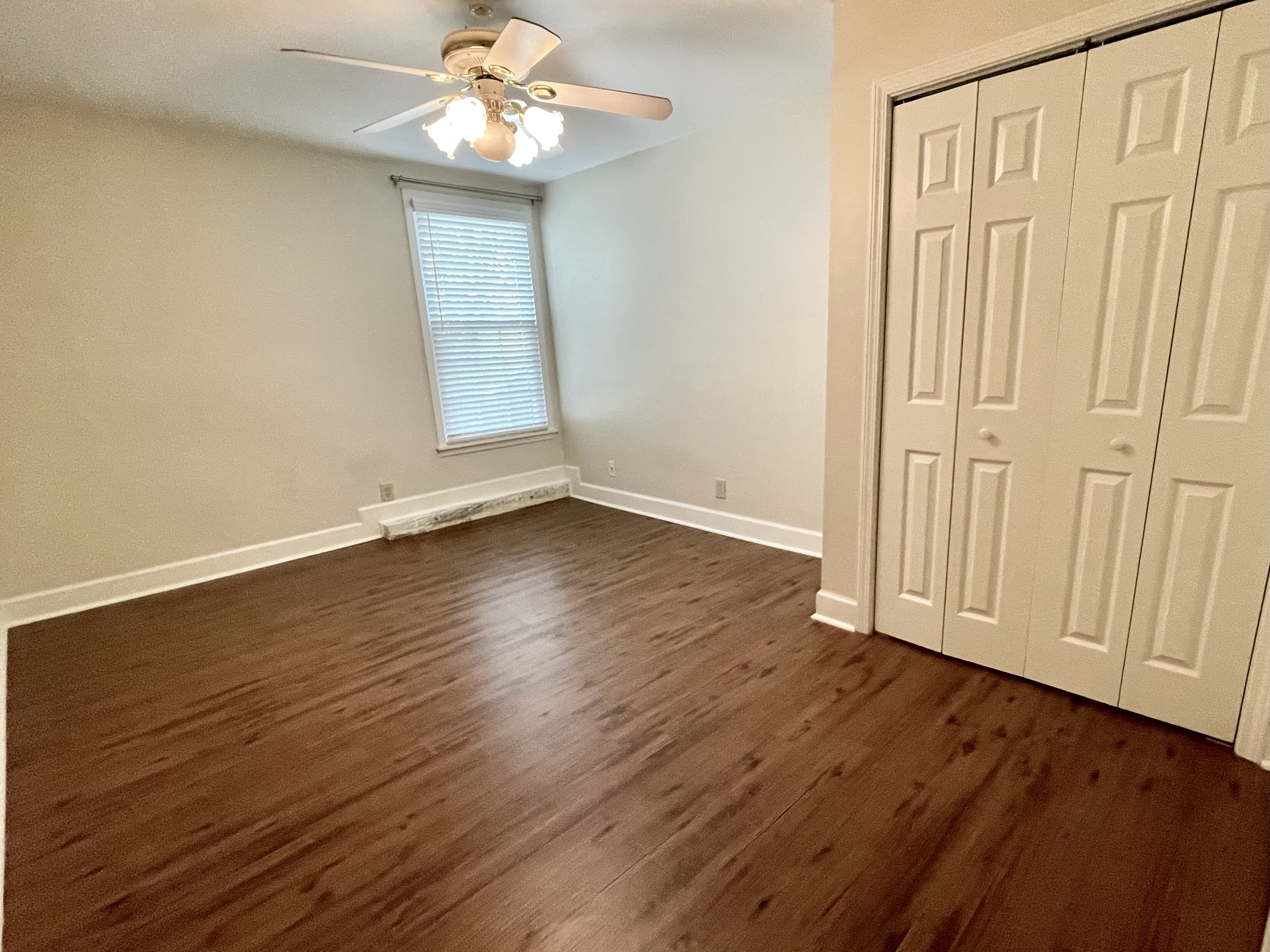 Office and study Room 2 with ceiling fan and closet