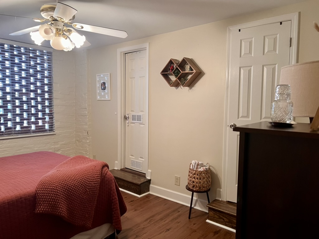 Bedroom 3 showing closet and bathroom doors